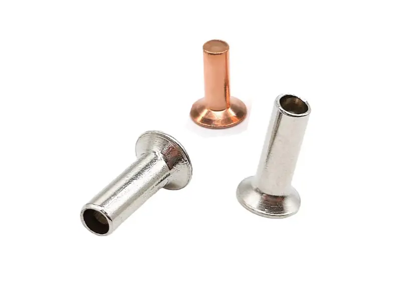 Upotuspään puoliputkimaiset niitit